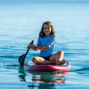 Child,Girl,Is,Riding,Sup,Stand,Up,Paddle,On,Vacation.