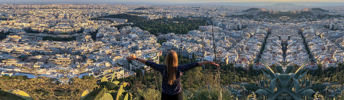 Student overlooking Athens
