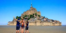 Family,Traveling,In,France-,Famous,Touristic,Of,Le,Mont,Saint