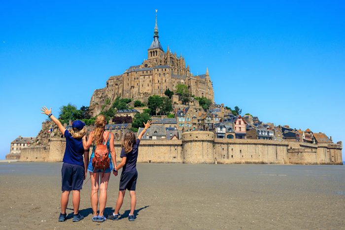 Family,Traveling,In,France-,Famous,Touristic,Of,Le,Mont,Saint